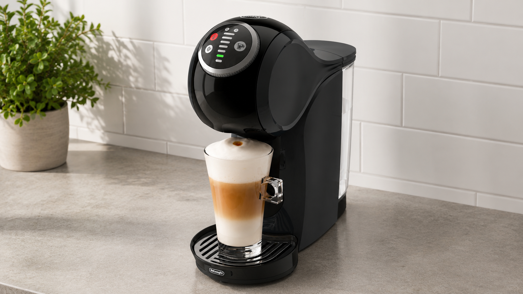 Nescafé Dolce Gusto De’Longhi Genio S coffee machine displayed on a light kitchen worktop.